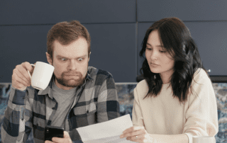 Couple concerned about debt.